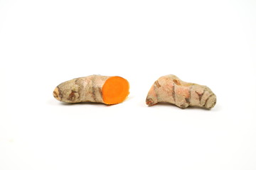 Fresh turmeric isolated on a white background is used as a tonic for the body and food ingredients.