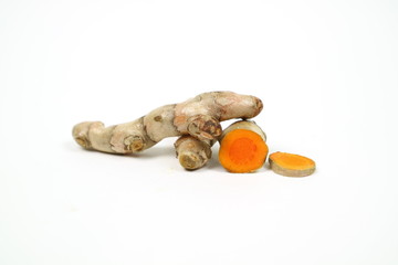Fresh turmeric isolated on a white background is used as a tonic for the body and food ingredients.