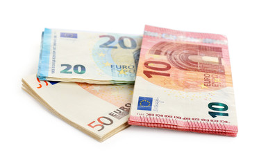 Euro banknotes on white background. Money and finance
