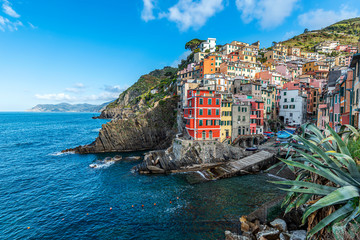 Fototapeta na wymiar The view at Riomaggiore, the first village of the Cinque Terre coastal area in the Northwest of Italy.