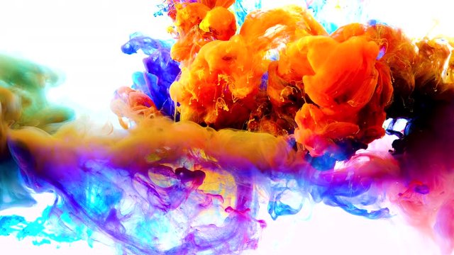 4K ,Color paint drops in water , abstract color mix , drop of Ink color mix paint falling on water Colorful ink in water, 4K footage,