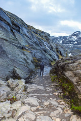 Tourist walk along the trail to Trolltunga, Norway.