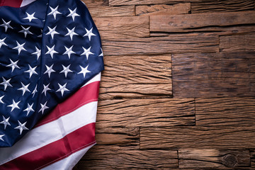 American Flag On Wooden Background