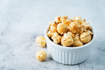 Caramel sweet Popcorn in a white bowl