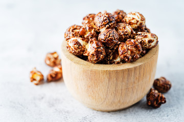 Chocolate caramel sweet Popcorn in a white bowl