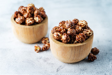 Chocolate caramel sweet Popcorn in a white bowl