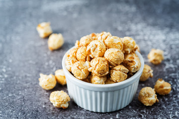 Caramel sweet Popcorn in a white bowl