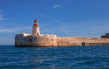 lighthouse on an island - 314745749