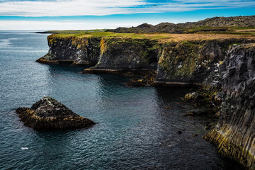 Fototapeta premium Iceland - Cliffs and Island on the Coastline - Londrangar