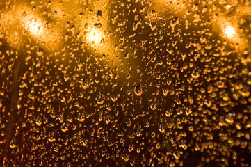 Light illumination. Christmas garlands. Raindrops on a New Year's garland. Light garlands.