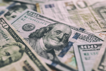 International currencies background. Money from different countries: dollars, euros. euro and dollar banknotes. money background. leading currencies. Selective focus. Close-up.