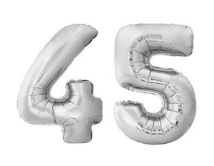 Number 45 forty five made of silver inflatable balloons isolated on white background. Chrome silver helium balloons forming 45 forty five number