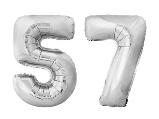 Number 57 fifty seven made of silver inflatable balloons isolated on white background. Silver chrome helium balloons forming 57 fifty seven number