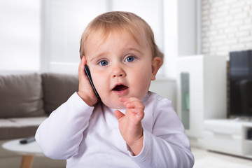 Small Girl Calling On Smartphone