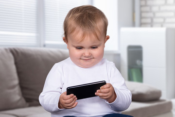 Little Girl With Mobile Phone