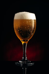 Glass of beer on wooden