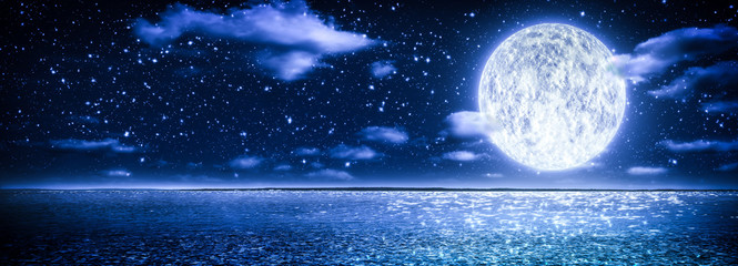 Romantic Moon With Clouds And Starry Sky Over Sparkling Blue Water - obrazy, fototapety, plakaty