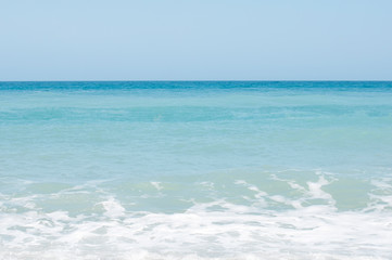 Beautiful waves foaming, water swallow as a background.