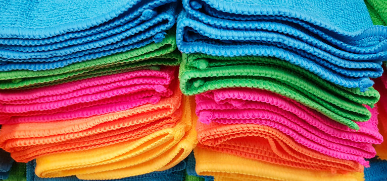 Pile of Multicolored Cloths used for background wallpaper textures