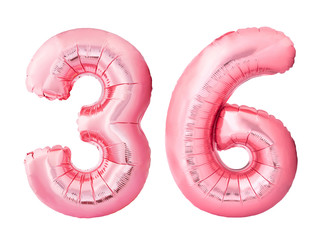 Number 36 thirty six made of rose gold inflatable balloons isolated on white background. Pink helium balloons forming 36 thirty six. Birthday concept