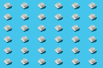 pattern cup of coffee on trendy blue background, isometric style. Use for printing. View from above. Top view. Cup without drink