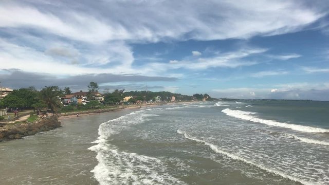 Matara, Sri Lanka, waves and clouds in good weather 4K
