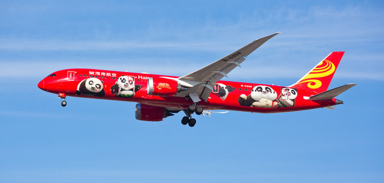 Chicago, USA - December 18, 2017:  A Hainan Airlines Boeing 787 aircraft displaying the Kung Fu Panda livery, on final approach to O'Hare International Airport.
