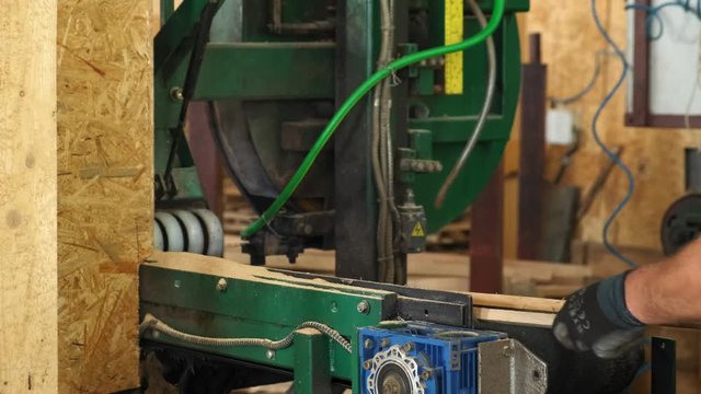 Woodworking factory. Cutting boards into rectangular slats. Slow motion. 4k