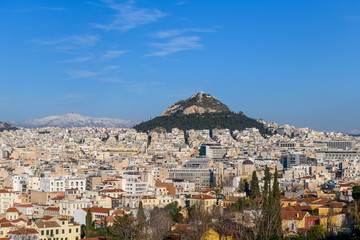 Fototapeta na wymiar Day view to Athens and Lycabettus Hill in the background. Athens, Greece.