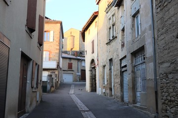 Fototapeta na wymiar La rue Victor Hugo dans le village de Saint Donat sur l'Herbasse - Département de la Drôme - France