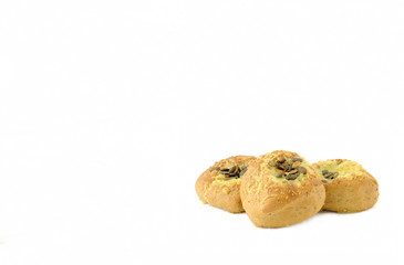 Three seed topped baked breads white background