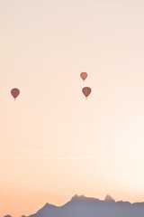 two hearts on the background of blue sky and clouds