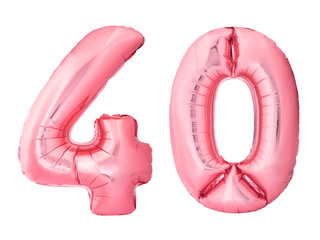 Number 40 forty made of rose gold inflatable balloons isolated on white background. Pink helium balloons forming 40 forty number. Discount and sale or birthday concept