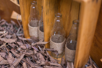 vintage decorations from wood and used bottles