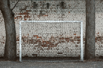 football gates on the sports ground. sports football gates against the background of a brick wall.
