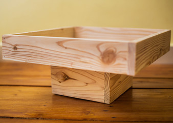 Small wooden tray made of used pallet wood.