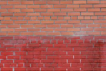 Fototapeta na wymiar background of a red and orange brick wall. 