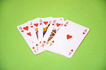 Winner poker cards over a green background