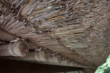 The part of Japanese traditional thatch roof house, close up. The detail of the roof of the ancient building architecture in Japan.