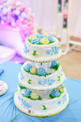 a cake decorated for the bride and groom at a wedding