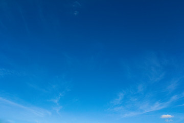 Clear blue sky with clouds for background picture.