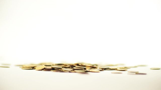 White-gloved hands scooping up a pile of gold coins. They sort out and scatter money.On white background. Garland. Money glitters.