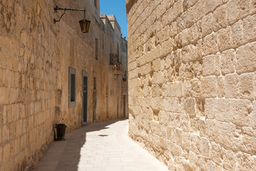 View of narrow medieval street of Mdina, Malta. 