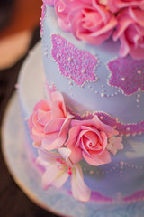 a cake decorated for the bride and groom at a wedding