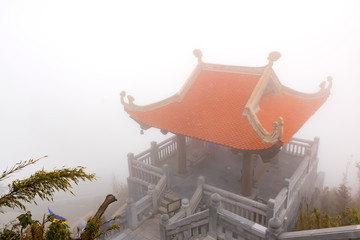 Pagoda of the highest mountain of Vietnam Fansipan under cable car in Sapa, Vietnam