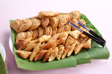 Curry puff that is ready to be served for guests at a ceremony.