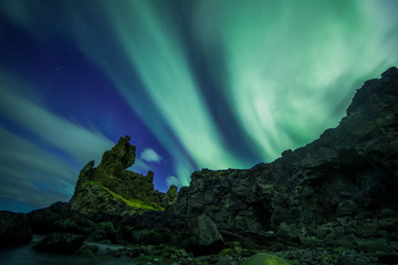 Aurora Borealis (Northern Lights) above londrangar rock formation