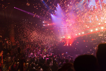 Fototapeta na wymiar Explosive confetti at an entertainment party concert
