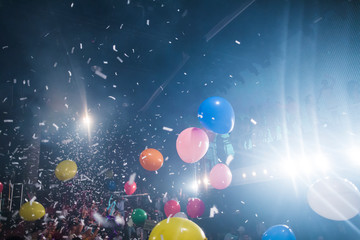 Obraz na płótnie Canvas Explosive confetti at an entertainment party concert