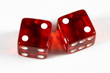 Red Dice with snake eyes showing on white background
